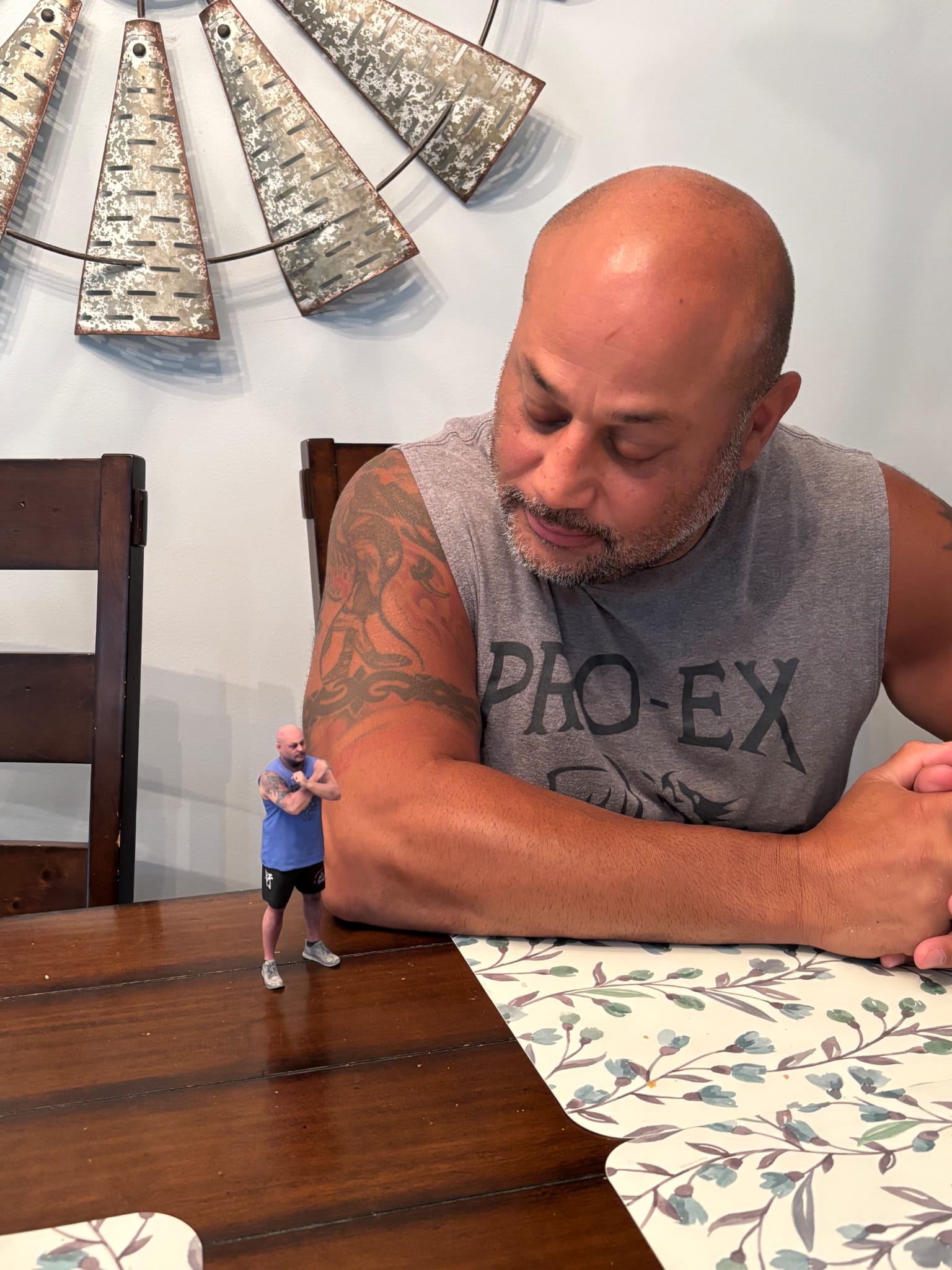 A MetaScan 3D-printed figurine keepsake held in hand